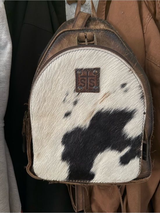 cow leather backpack Hair on Hide | Boho Cowhide Leather Handbags a front zip pocket Natural Brown and White Cow